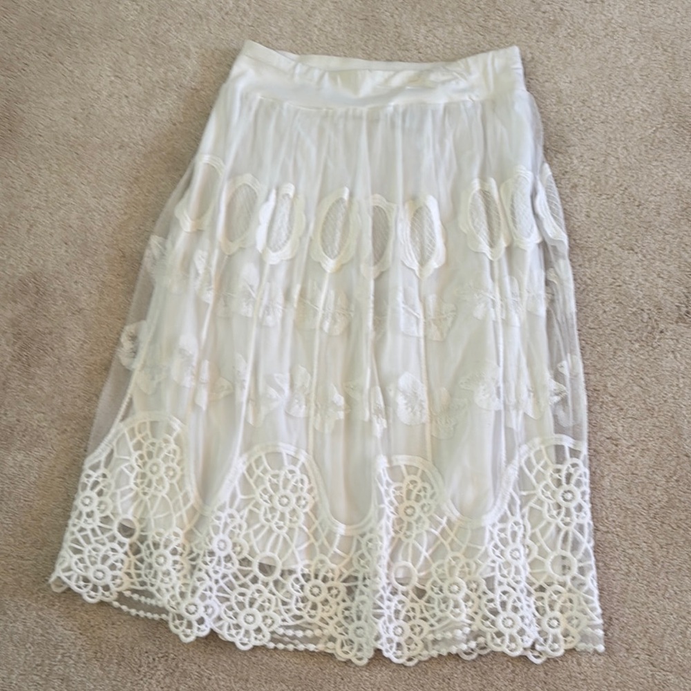 Ovi Cream Midi A-Line Skirt with Pleated Embellishments